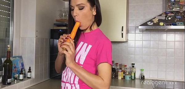  Russian pornstar Nataly Gold rubs her hole with carrot in the kitchen